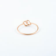 Rose Gold Diamond Solitaire Ring with Open Swirl Motif