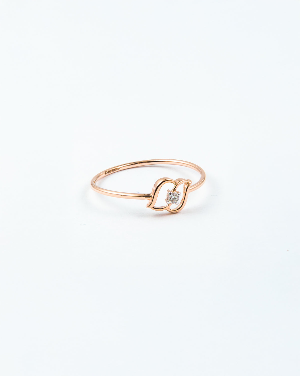 Rose Gold Diamond Solitaire Ring with Open Swirl Motif