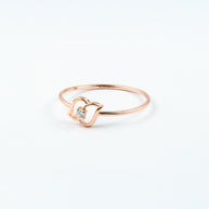 Rose Gold Diamond Solitaire Ring with Open Swirl Motif