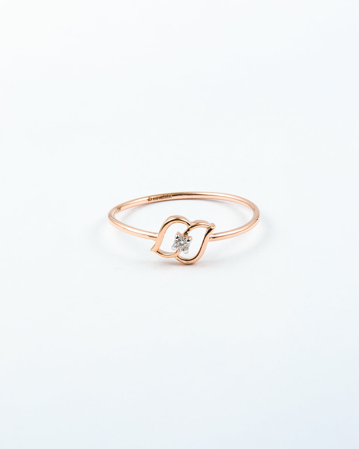 Rose Gold Diamond Solitaire Ring with Open Swirl Motif