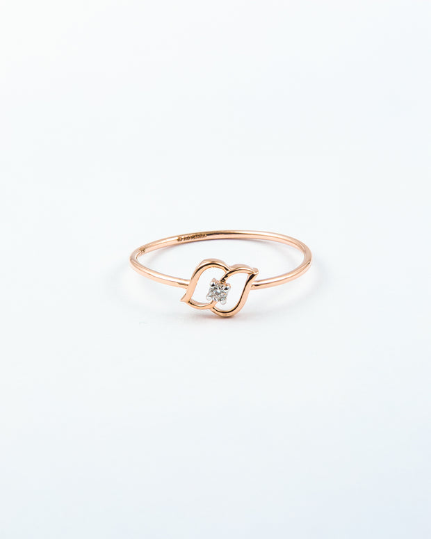 Rose Gold Diamond Solitaire Ring with Open Swirl Motif