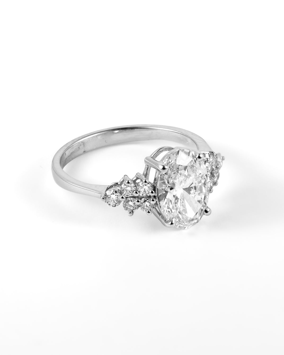 Oval Brilliant Lab-Grown Diamond Engagement Ring with Side Clusters